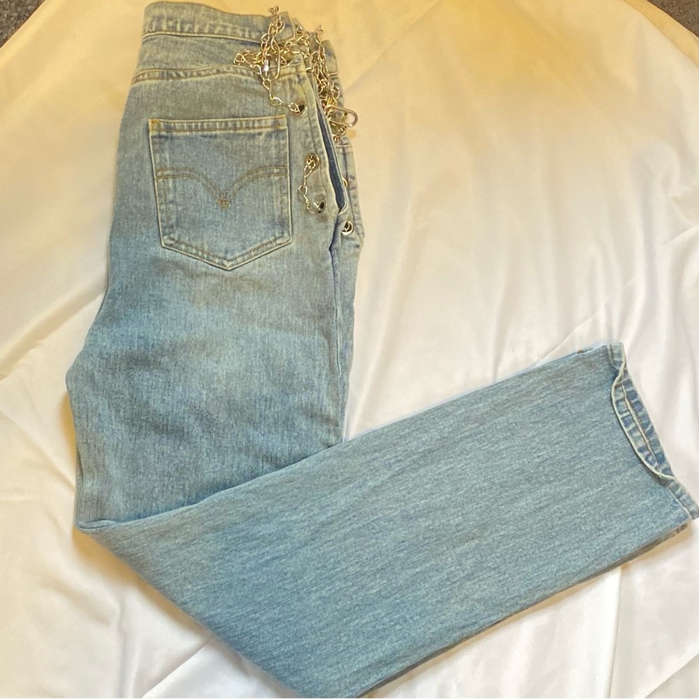 baggy light wash jeans with chains on the side!